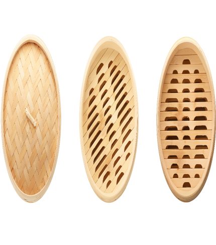 Set with bamboo steamer on white background, top view