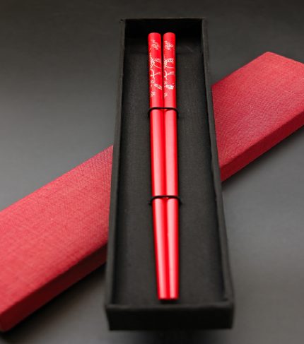 Red chopsticks.in gift box.
