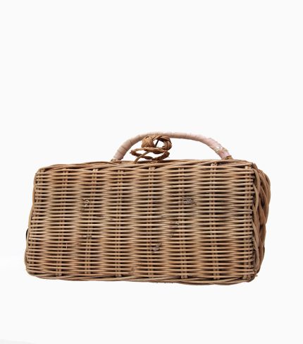 a handicraft product in the form of a tote bag made of hand woven, bamboo or rattan material
